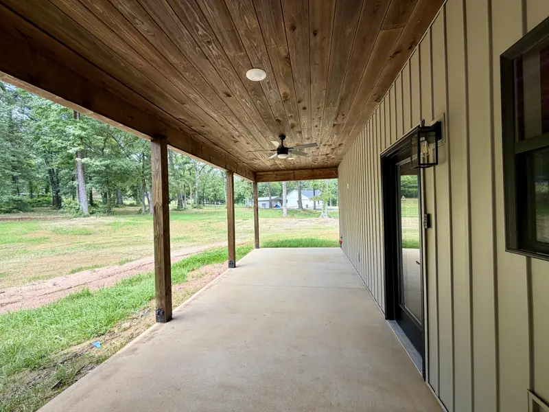 Covered back porch with wood ceiling