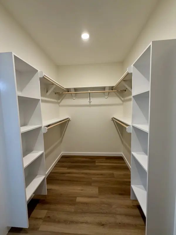 Walk-in closet with built-in shelving