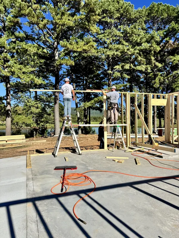 Crew raising walls