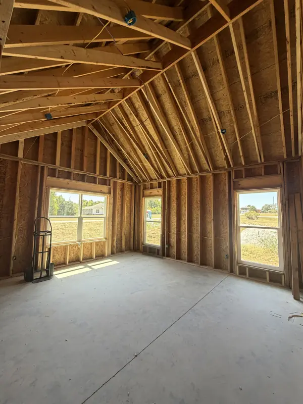Roof framing over a room with windows