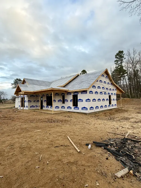 New home wrapped and dried in at dusk