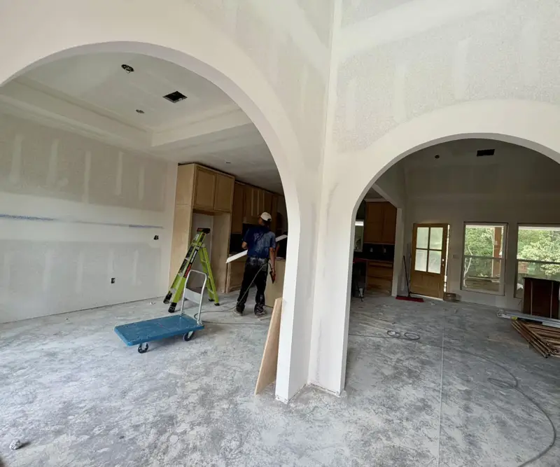 Arched openings drywalled in a custom home