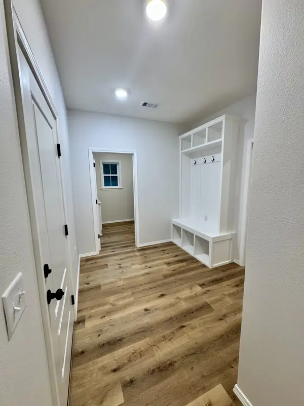 Built-in mudroom cubbies and bench