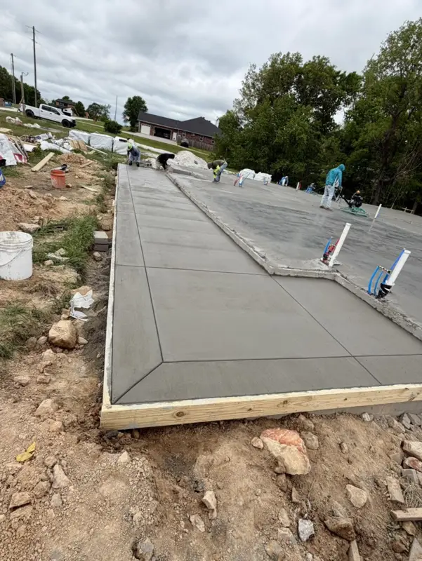 Freshly poured house slab with the forms still on